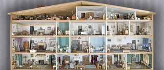 Huge Dollhouse showing miniature furniture