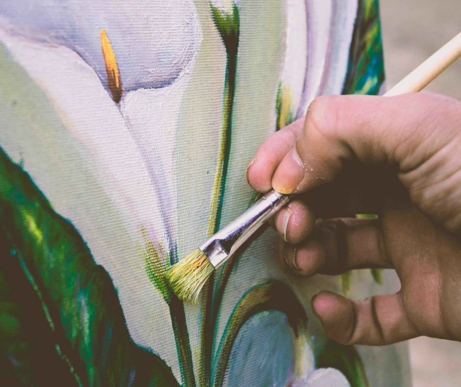 lily being painted by person